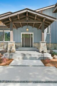 A large porch ceiling was designed and built using custom resawn timber