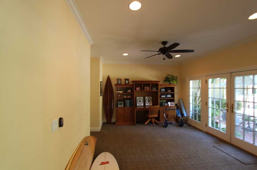 These new custom built-ins were designed with beadboard panels, open shelving, and uplighting