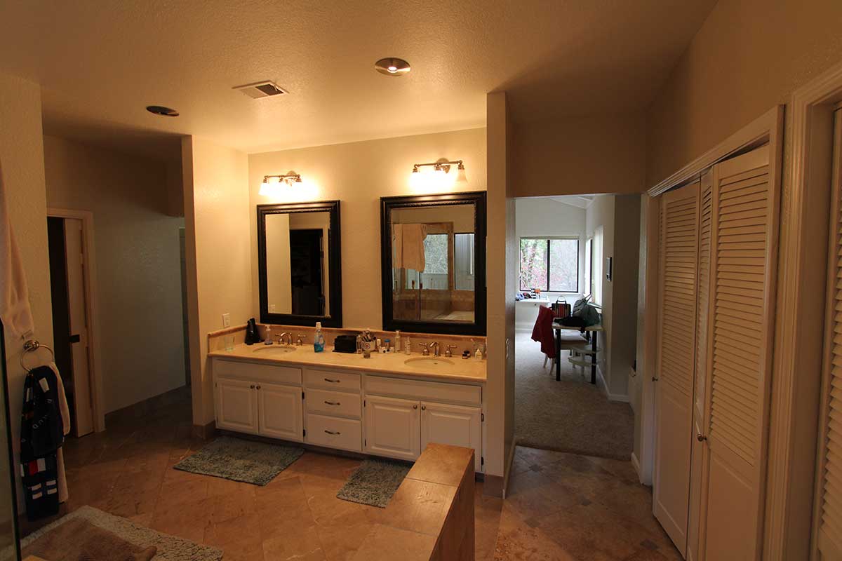 Bathroom cabinets with white quartz countertops