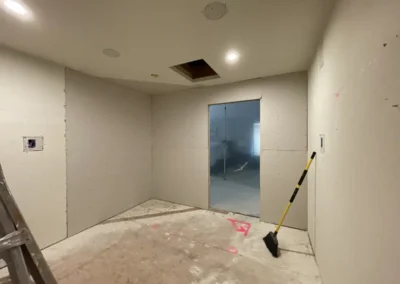 DRYWALL INSTALLATION BEGINS IN THE REMODELED SPACES